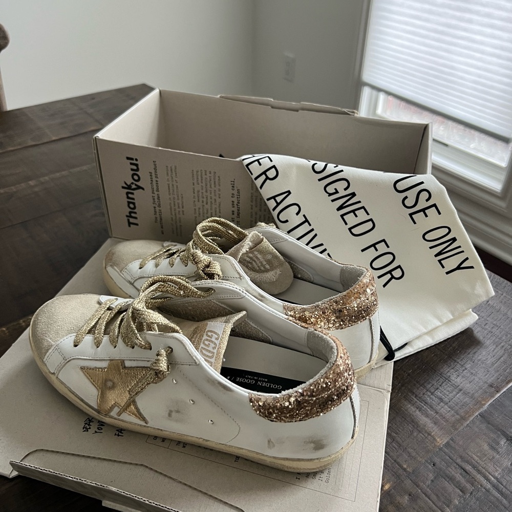Golden Goose Women’s White and Gold Sneakers